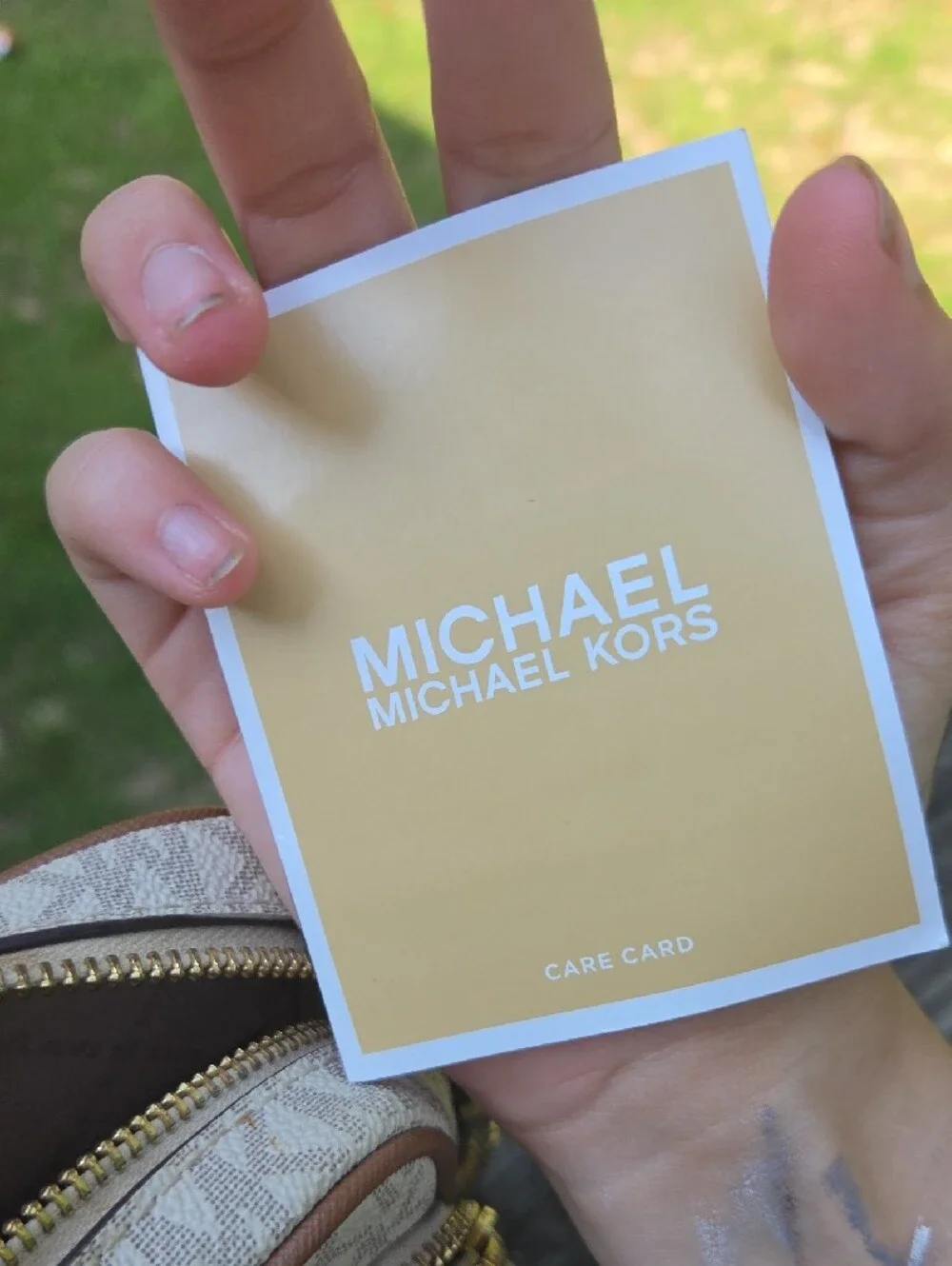 Michael Kors Cream Logo Crossbody Bag with Brown Trim